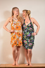 Load image into Gallery viewer, Buy now online, Emma's Emporium bold floral summer sun beach dress! floral print loose fit sun dress. Buy now from Emma's Emporium online store, ethical alternative women's fashion; hippie festival clothing and accessories, ethically sourced from India and South America. Shop online or find us at a festival. All clothing and products available for UK wholesale.