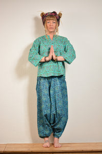 Buy now online, Emma's Emporium floral Genie trousers, lightweight cotton loose fit trousers in beautiful Indian floral print. Buy now from Emma's Emporium online store, ethical alternative women's fashion; hippie festival clothing and accessories, ethically sourced from India and South America. Shop online or find us at a festival. All clothing and products available for UK wholesale.