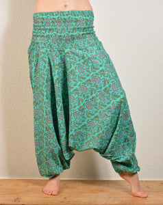 Buy now online, Emma's Emporium floral Genie Harem trousers, lightweight cotton loose fit trousers in beautiful Indian floral print. Buy now from Emma's Emporium online store, ethical alternative women's fashion; hippie festival clothing and accessories, ethically sourced from India and South America. Shop online or find us at a festival. All clothing and products available for UK wholesale.