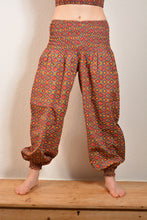 Load image into Gallery viewer, Buy now online, Emma&#39;s Emporium floral Genie Harem trousers, lightweight cotton loose fit trousers in unique retro inspired red diamond print. Buy now from Emma&#39;s Emporium online store, ethical alternative women&#39;s fashion; hippie festival clothing and accessories, ethically sourced from India and South America. Shop online or find us at a festival. All clothing and products available for UK wholesale.
