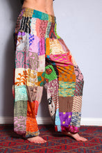 Load image into Gallery viewer, Emma's Emporium colourful patchwork baggy harem genie alibaba hippie hippy trousers pants. Emma's Emporium slow ethical festival fashion and women's clothing.