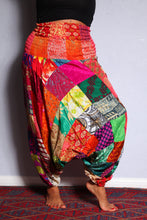 Load image into Gallery viewer, Emma's Emporium colourful patchwork baggy harem genie alibaba hippie hippy trousers pants. Emma's Emporium slow ethical festival fashion and women's clothing.