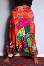 Load image into Gallery viewer, Emma's Emporium colourful patchwork baggy harem genie alibaba hippie hippy trousers pants. Emma's Emporium slow ethical festival fashion and women's clothing.