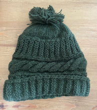 Load image into Gallery viewer, Buy now online from Emma's Emporium, Colourful Nepalese cable knit Pompom Bobble Hat! Keep your head warm this winter! Pure wool hand knitted hats in vibrant bold colours. Made for Emma's Emporium with love by our friends in Kathmandu.