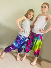 Load image into Gallery viewer, Emma's Emporium Tie dye vibrant colourful children's unisex comfy loose fit harem genie Alibaba afghani trousers for ages 1 year to 10 years, for toddlers and young children. Emma's Emporium online slow ethical alternative festival fashion.