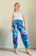 Load image into Gallery viewer, Emma's Emporium Tie dye vibrant colourful children's unisex comfy loose fit harem genie Alibaba afghani trousers for ages 1 year to 10 years, for toddlers and young children. Emma's Emporium online slow ethical alternative festival fashion.