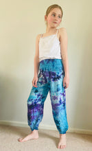 Load image into Gallery viewer, Emma's Emporium Tie dye vibrant colourful children's unisex comfy loose fit harem genie Alibaba afghani trousers for ages 1 year to 10 years, for toddlers and young children. Emma's Emporium online slow ethical alternative festival fashion.