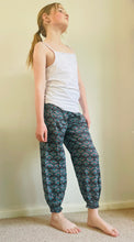 Load image into Gallery viewer, Emma's Emporium peacock print cotton colourful children's unisex comfy loose fit harem genie Alibaba afghani trousers for ages 1 year to 10 years, for toddlers and young children. Emma's Emporium online slow ethical alternative festival fashion.