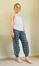 Load image into Gallery viewer, Emma's Emporium peacock print cotton colourful children's unisex comfy loose fit harem genie Alibaba afghani trousers for ages 1 year to 10 years, for toddlers and young children. Emma's Emporium online slow ethical alternative festival fashion.