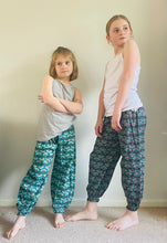 Load image into Gallery viewer, Emma's Emporium peacock print cotton colourful children's unisex comfy loose fit harem genie Alibaba afghani trousers for ages 1 year to 10 years, for toddlers and young children. Emma's Emporium online slow ethical alternative festival fashion.