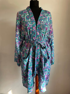 Buy now online, Emma's Emporium colourful paisley floral kimono dressing gown, loose summer jacket. Check out Emma's Emporium online store, ethical alternative women's fashion; hippie festival clothing and accessories, ethically sourced. Shop online or find us at a festival. All clothing and products available for UK wholesale.