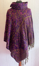 Load image into Gallery viewer, Buy now online from Emma's Emporium! Fleecy fleece vegan wool warm winter hippie hippy poncho, with collar, pocket and tassel edge. Perfect for cool summer evenings and hippie festivals. Shop Emma's Emporium ethical fair trade slow fashion and alternative women's clothing and apparel.