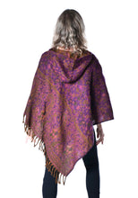 Load image into Gallery viewer, Woman in an Emma's Emporium paisley poncho with a hood and front pocket. Shop Emma's Emporium online now, ethical slow alternative hippie festival fashion and women's clothing and apparel.