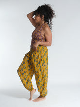 Load image into Gallery viewer, Buy now online! Emma's Emporium relax fit cotton harem genie baggy trouser pant. Floral block print cotton and mixed vibrant colours. Buy Emma's Emporium, slow fashion, ethically sourced, Indian cotton women's summer trouser. Hippie hippy festival alternative clothing.