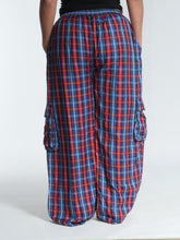 Load image into Gallery viewer, Buy now online at Emma's Emporium! Unisex Plaid Check Cargo Trousers. Experience comfort and style with these loose fit trousers in plaid cotton. Loose fit with an elastic waistband and lots of pockets, they offer a flattering, flexible fit and convenient relaxed style. Emma's Emporium ethical fashion, alternative women's clothing, festival hippie styles.