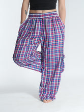 Load image into Gallery viewer, Buy now online at Emma's Emporium! Unisex Plaid Check Cargo Trousers. Experience comfort and style with these loose fit trousers in plaid cotton. Loose fit with an elastic waistband and lots of pockets, they offer a flattering, flexible fit and convenient relaxed style. Emma's Emporium ethical fashion, alternative women's clothing, festival hippie styles.