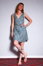 Load image into Gallery viewer, Shop Emma's Emporium buy online! Emma's Emporium print cotton summer sun dress. Bias cut, knee length with a v neckline. Emma's Emporium ethical slow fashion, fair trade, women's clothing, hippie hippy boho festival dress.