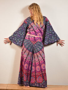 Summer Palazzo pants. Buy online from Emma's Emporium wholesale women's festival, alternative and hippie clothing. Colourful peacock print cotton  PALAZZO genie harem loose summer trousers. Shop now at Emma's Emporium UK clothing retail.