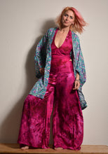 Load image into Gallery viewer, Summer Palazzo pants. Buy online from Emma's Emporium wholesale women's festival, alternative and hippie clothing. Multicoloured rainbow tie dye PALAZZO genie harem loose summer trousers. Shop now at Emma's Emporium UK clothing retail.