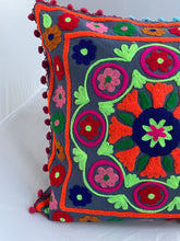 Load image into Gallery viewer, Available to buy online now from Emma's Emporium! Rainbow mandala embroidered Cushion Covers. Brightly coloured embroidery on a cotton background, with pom pom's. Extra large bold and eye catching cushion covers for a boho home. Visit Emma's Emporium for alternative women's clothing, festival fashion and hippy styles.