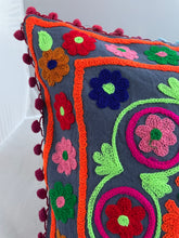 Load image into Gallery viewer, Available to buy online now from Emma's Emporium! Rainbow mandala embroidered Cushion Covers. Brightly coloured embroidery on a cotton background, with pom pom's. Extra large bold and eye catching cushion covers for a boho home. Visit Emma's Emporium for alternative women's clothing, festival fashion and hippy styles.