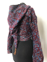 Load image into Gallery viewer, Emma&#39;s Emporium ethical global fashion. boho style pixie wrap top. Crop top cardi in paisley pattern with hood and trumpet sleeves.
