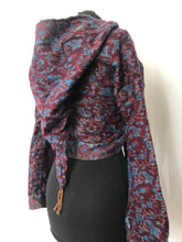 Load image into Gallery viewer, Emma's Emporium ethical global fashion. boho style pixie wrap top. Crop top cardi in paisley pattern with hood and trumpet sleeves.