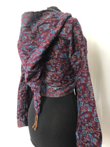 Emma's Emporium ethical global fashion. boho style pixie wrap top. Crop top cardi in paisley pattern with hood and trumpet sleeves.