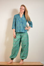 Load image into Gallery viewer, Buy now online, Emma&#39;s Emporium floral Genie trousers, lightweight cotton loose fit trousers in beautiful Indian floral print. Buy now from Emma&#39;s Emporium online store, ethical alternative women&#39;s fashion; hippie festival clothing and accessories, ethically sourced from India and South America. Shop online or find us at a festival. All clothing and products available for UK wholesale.
