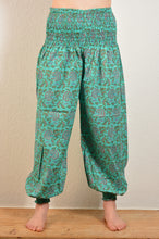 Load image into Gallery viewer, Buy now online, Emma&#39;s Emporium floral Genie trousers, lightweight cotton loose fit trousers in beautiful Indian floral print. Buy now from Emma&#39;s Emporium online store, ethical alternative women&#39;s fashion; hippie festival clothing and accessories, ethically sourced from India and South America. Shop online or find us at a festival. All clothing and products available for UK wholesale.
