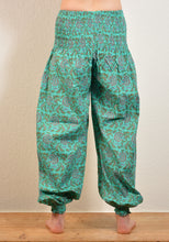 Load image into Gallery viewer, Buy now online, Emma&#39;s Emporium floral Genie trousers, lightweight cotton loose fit trousers in beautiful Indian floral print. Buy now from Emma&#39;s Emporium online store, ethical alternative women&#39;s fashion; hippie festival clothing and accessories, ethically sourced from India and South America. Shop online or find us at a festival. All clothing and products available for UK wholesale.
