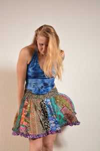 Emma's Emporium online! Shop our new collection now. Recycled sari patchwork mini skirt, with elastic waist and frill edging. Each skirt is unique, made from a mix of colourful patterned sari scraps - this is a zero waste skirt! 