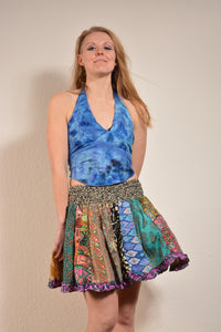 Emma's Emporium online! Shop our new collection now. Recycled sari patchwork mini skirt, with elastic waist and frill edging. Each skirt is unique, made from a mix of colourful patterned sari scraps - this is a zero waste skirt! 