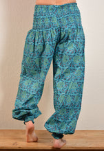 Load image into Gallery viewer, Buy now online, Emma&#39;s Emporium floral Genie trousers, lightweight cotton loose fit trousers in beautiful Indian floral print. Buy now from Emma&#39;s Emporium online store, ethical alternative women&#39;s fashion; hippie festival clothing and accessories, ethically sourced from India and South America. Shop online or find us at a festival. All clothing and products available for UK wholesale.
