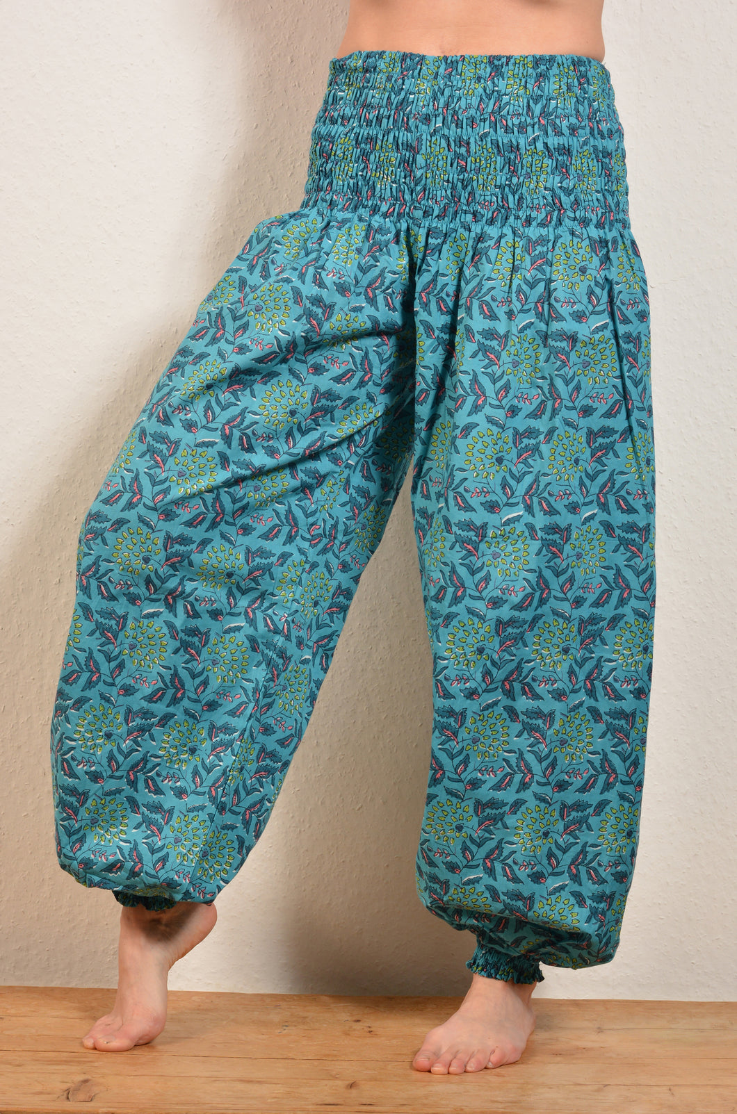 Buy now online, Emma's Emporium floral Genie trousers, lightweight cotton loose fit trousers in beautiful Indian floral print. Buy now from Emma's Emporium online store, ethical alternative women's fashion; hippie festival clothing and accessories, ethically sourced from India and South America. Shop online or find us at a festival. All clothing and products available for UK wholesale.