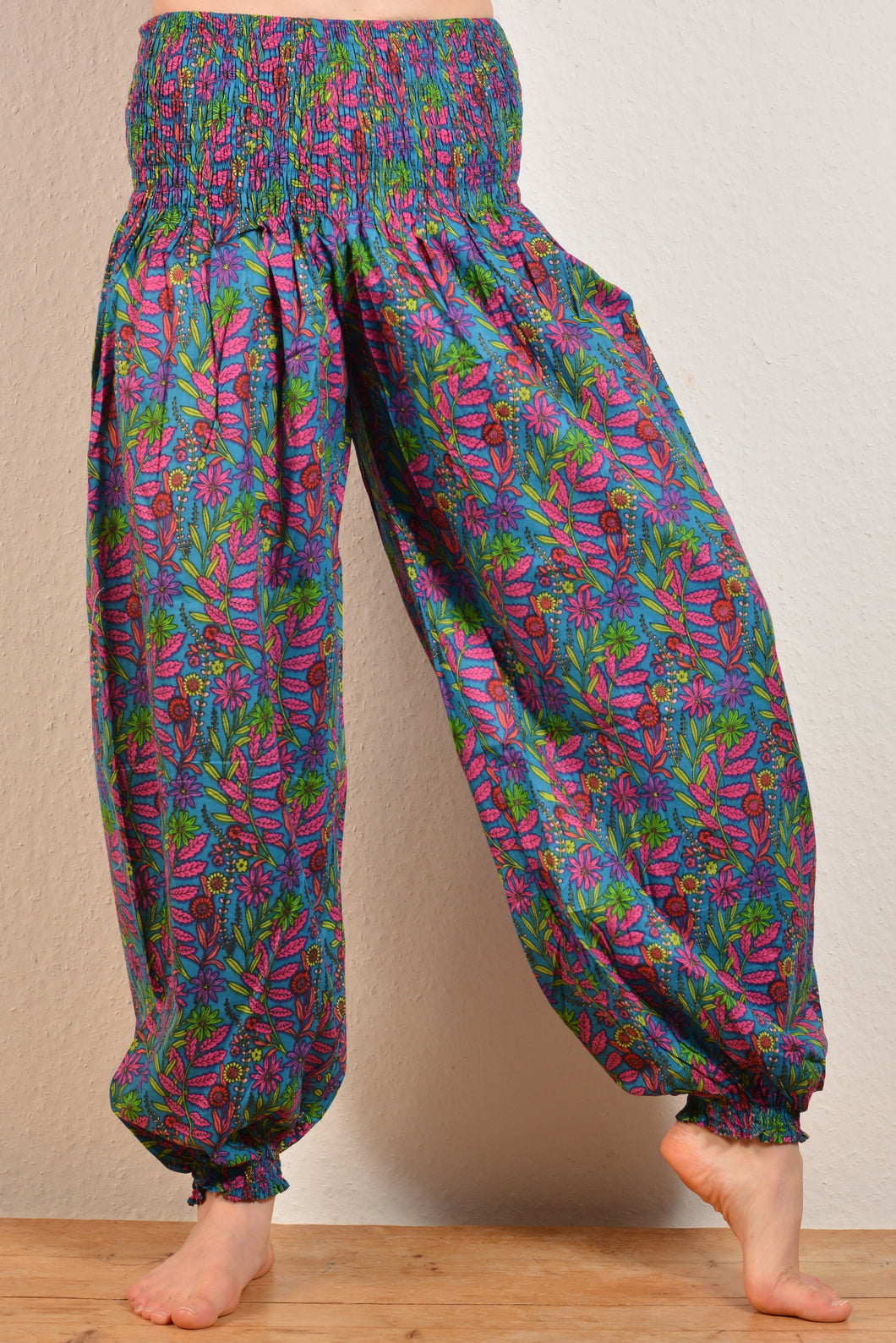 Buy now online, Emma's Emporium floral Genie trousers, lightweight cotton loose fit trousers in beautiful Indian floral print. Buy now from Emma's Emporium online store, ethical alternative women's fashion; hippie festival clothing and accessories, ethically sourced from India and South America. Shop online or find us at a festival. All clothing and products available for UK wholesale.