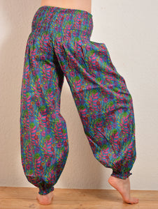 Buy now online, Emma's Emporium floral Genie trousers, lightweight cotton loose fit trousers in beautiful Indian floral print. Buy now from Emma's Emporium online store, ethical alternative women's fashion; hippie festival clothing and accessories, ethically sourced from India and South America. Shop online or find us at a festival. All clothing and products available for UK wholesale.