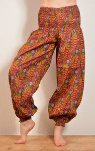 Buy now online, Emma's Emporium floral Genie trousers, lightweight cotton loose fit trousers in beautiful Indian floral print. Buy now from Emma's Emporium online store, ethical alternative women's fashion; hippie festival clothing and accessories, ethically sourced from India and South America. Shop online or find us at a festival. All clothing and products available for UK wholesale.