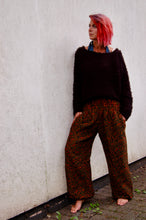 Load image into Gallery viewer, Emma&#39;s Emporium fleece genie harem trousers, loose fit warm winter  hippy pants, made from machine washable vegan fleece, in bright paisley design. Slow fashion, ethically sourced hippie festival hippy fashion.
