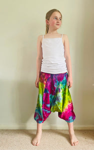 Emma's Emporium Tie dye vibrant colourful children's unisex comfy loose fit harem genie Alibaba afghani trousers for ages 1 year to 10 years, for toddlers and young children. Emma's Emporium online slow ethical alternative festival fashion.