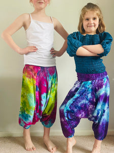 Emma's Emporium Tie dye vibrant colourful children's unisex comfy loose fit harem genie Alibaba afghani trousers for ages 1 year to 10 years, for toddlers and young children. Emma's Emporium online slow ethical alternative festival fashion.