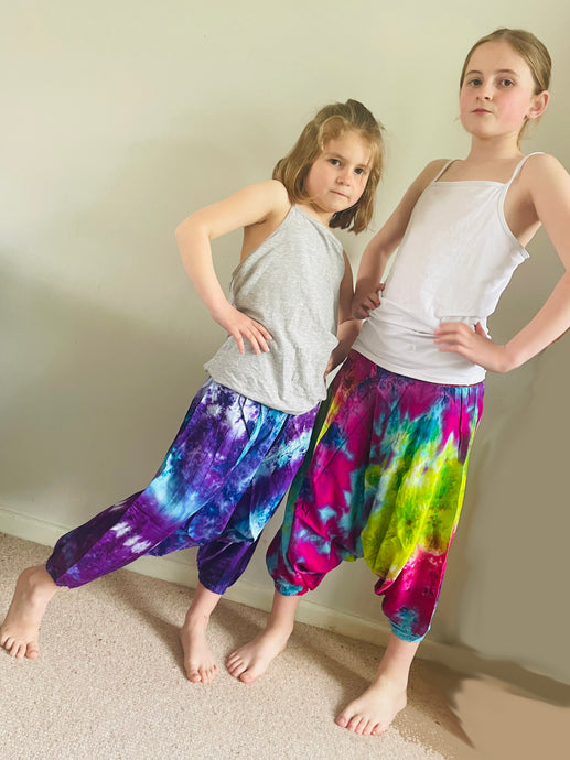 Emma's Emporium Tie dye vibrant colourful children's unisex comfy loose fit harem genie Alibaba afghani trousers for ages 1 year to 10 years, for toddlers and young children. Emma's Emporium online slow ethical alternative festival fashion.