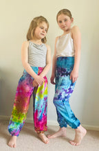 Load image into Gallery viewer, Emma&#39;s Emporium Tie dye vibrant colourful children&#39;s unisex comfy loose fit harem genie Alibaba afghani trousers for ages 1 year to 10 years, for toddlers and young children. Emma&#39;s Emporium online slow ethical alternative festival fashion.
