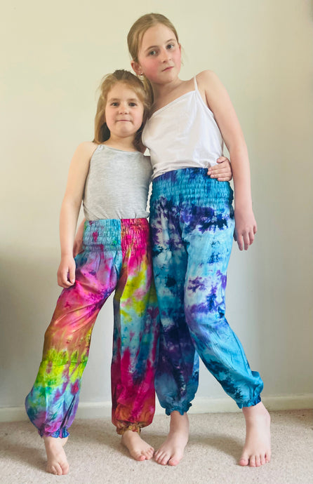 Emma's Emporium Tie dye vibrant colourful children's unisex comfy loose fit harem genie Alibaba afghani trousers for ages 1 year to 10 years, for toddlers and young children. Emma's Emporium online slow ethical alternative festival fashion.