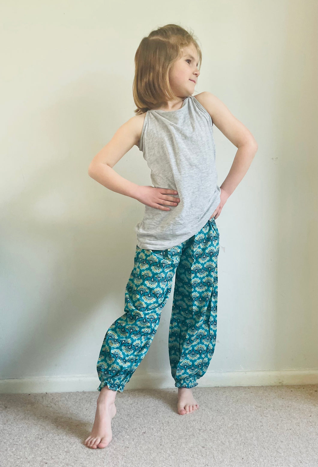 Emma's Emporium peacock print cotton colourful children's unisex comfy loose fit harem genie Alibaba afghani trousers for ages 1 year to 10 years, for toddlers and young children. Emma's Emporium online slow ethical alternative festival fashion.