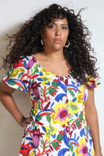 Load image into Gallery viewer, Emma&#39;s Emporium bold floral print summer beach dress, with elastic back and pockets. Colourful lightweight summer beach festival dress!
