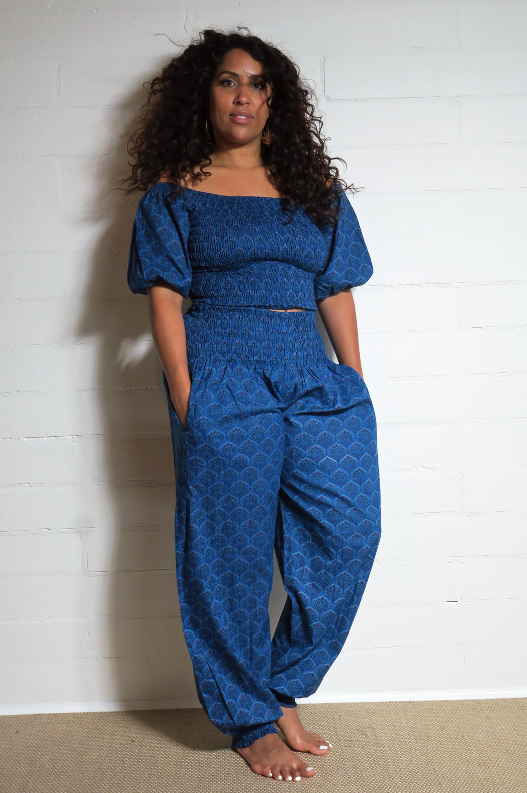Buy now online from Emma's Emporium, blue cotton peacock print bandeau sun summer top, perfect for beach, festival and party. Emma's Emporium designs and sources fair trade ethical women's clothing, gifts and accessories. Fun and fair hippie clothes and boho festival fashion.