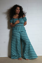 Load image into Gallery viewer, Emma&#39;s Emporium wide leg peacock print cotton palazzo flare trouser. Shope Emma&#39;s Emporium online, for retail and wholesale fair trade ethical women&#39;s alternative clothing, gifts and festival fashion. Hippy Hippie clothes, colourful and unique.
