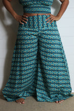Load image into Gallery viewer, Emma&#39;s Emporium wide leg peacock print cotton palazzo flare trouser. Shope Emma&#39;s Emporium online, for retail and wholesale fair trade ethical women&#39;s alternative clothing, gifts and festival fashion. Hippy Hippie clothes, colourful and unique.
