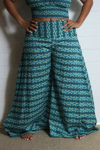 Emma's Emporium wide leg peacock print cotton palazzo flare trouser. Shope Emma's Emporium online, for retail and wholesale fair trade ethical women's alternative clothing, gifts and festival fashion. Hippy Hippie clothes, colourful and unique.
